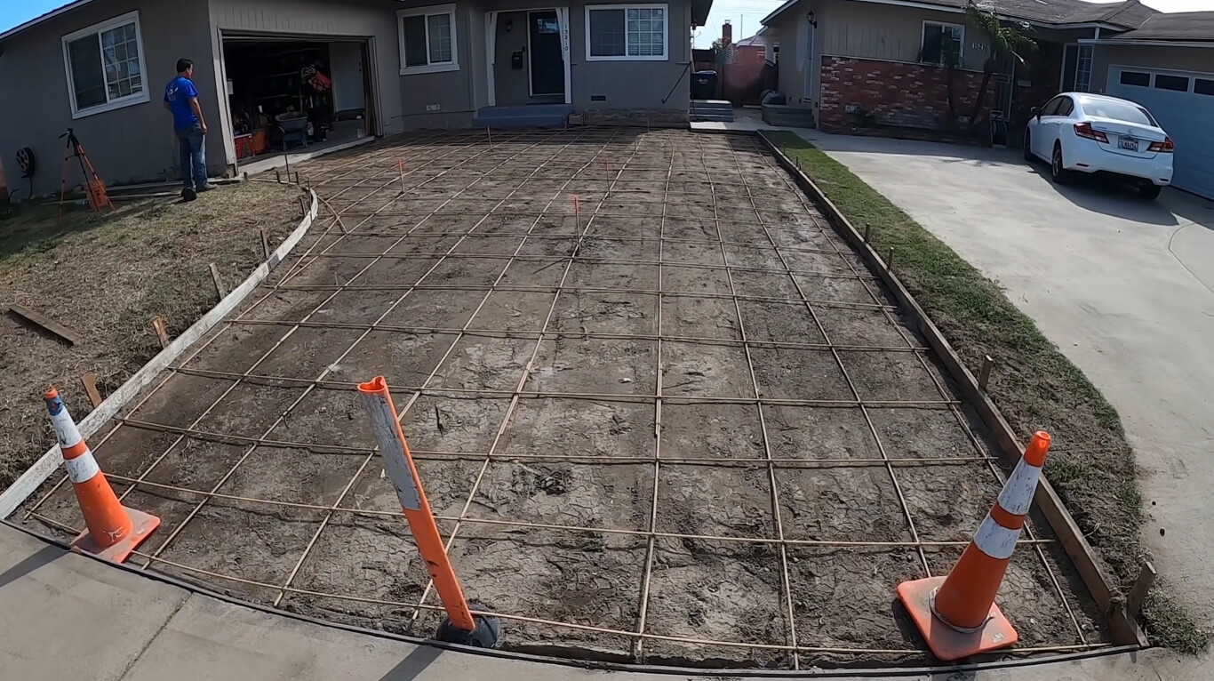 Concrete slab preparation with proper grading and base for driveway in Blue Springs
