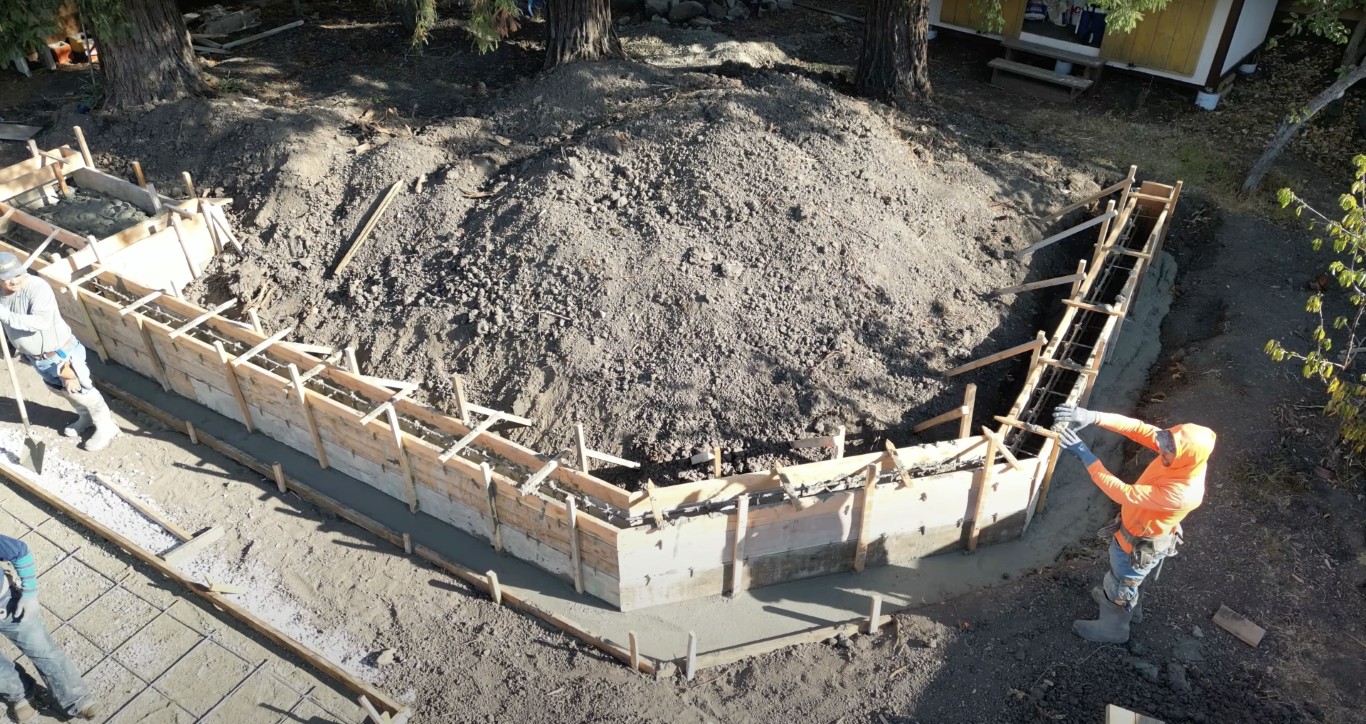 Aerial view of concrete foundation formwork for residential building