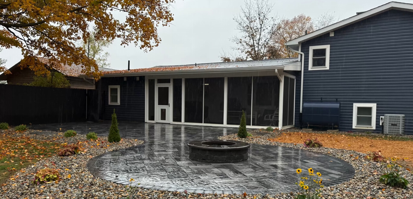 Stamped concrete patio with fire pit that withstands Missouri weather